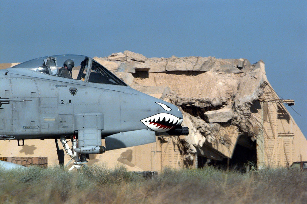 The pilot of a A-10A Thunderbolt monitors the cockpit instruments before taking off.