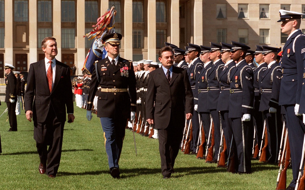 Secretary Cohen and Minister Kitanoski inspect the joint honor guard at the Pentagon.