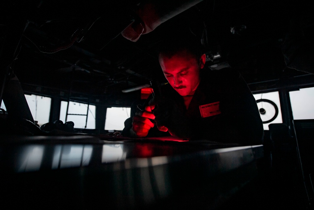 USS Sterett conducts operations in the Singapore Strait as part of the Carl Vinson Carrier Strike Group