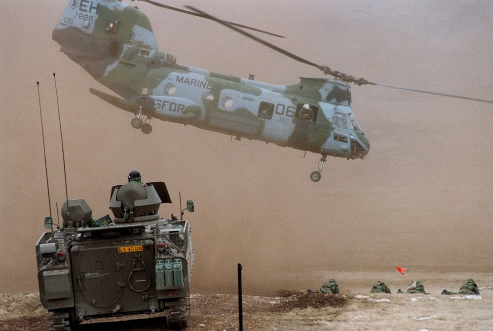 A U.S. Marine CH-46 Sea Knight lifts off after unloading Marines at Glamoc.