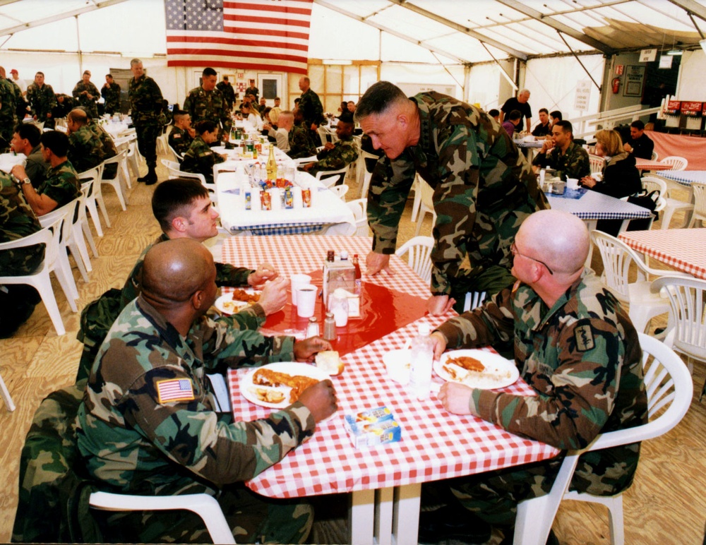 Gen. Shelton visits with soldiers at the Taszár Air Base, Hungary, dining facility.