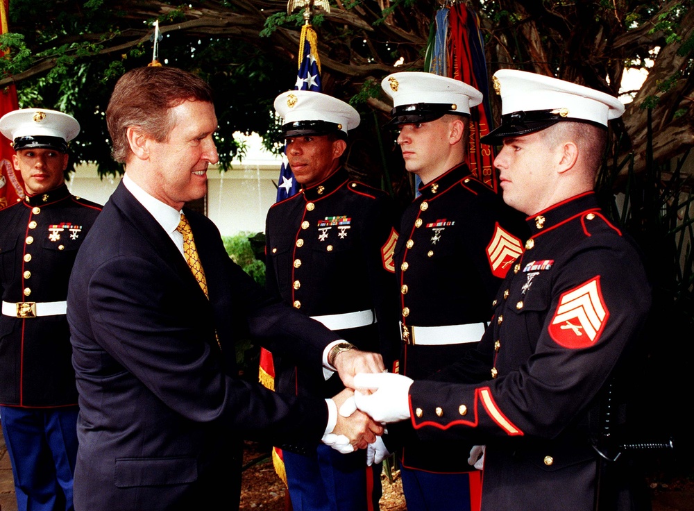Secretary Cohen presents mementos to U.S. Marines assigned to the  U.S. Embassy in Brazil.