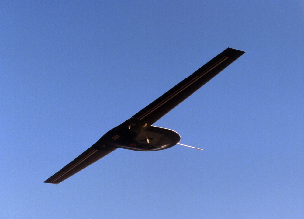 Tier III Minus DarkStar UAV flies over the NASA Dryden Flight Research Center.