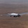 The second Tier III Minus DarkStar UAV flies over Edwards Air Force Base.