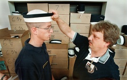 Kevin Maddaford gets fitted for a plebe hat at the U.S. Naval Academy.