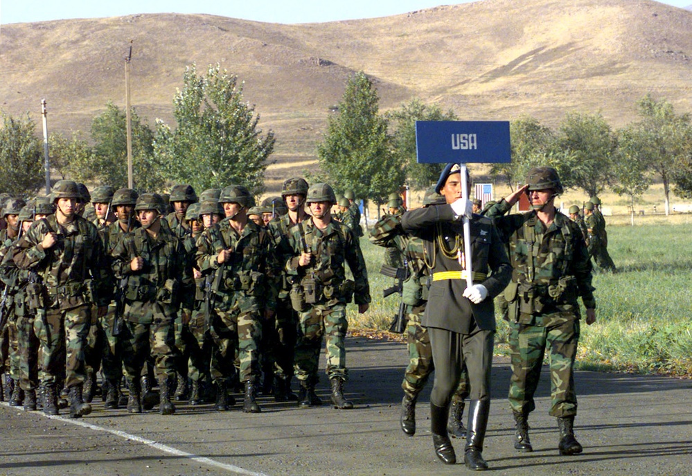 Soldiers from the 10th Mountain Division march past the reviewing stand in Chirchik, Uzbekistan.