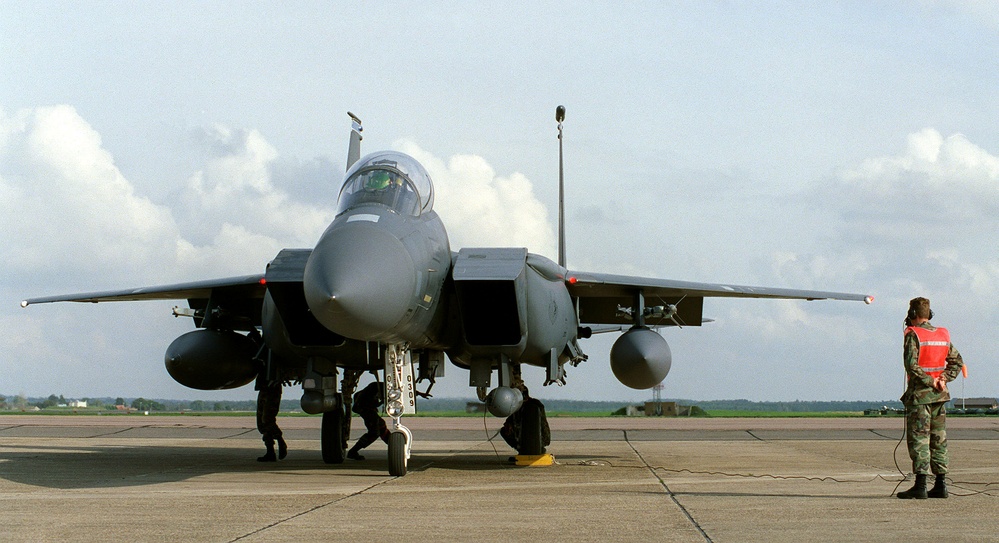 A U.S. Air Force F-15E Eagle is given a final check before takeoff at R.A.F. Mildenhall.