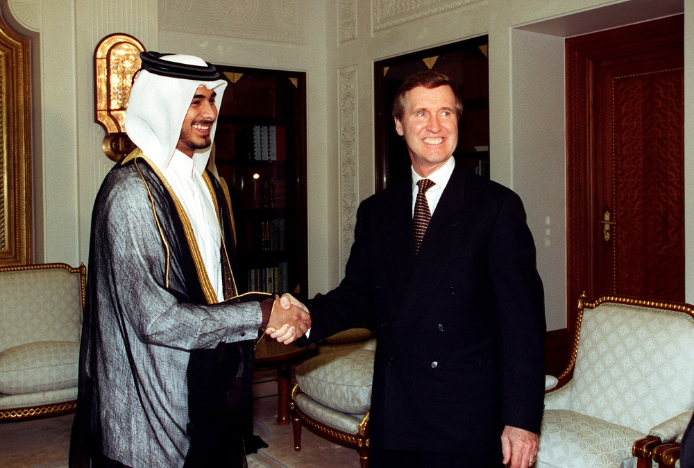 Crown Prince Sheikh Jassim bin Hamad bin Khalifa Al-Thani and Secretary Cohen pose for photographs.