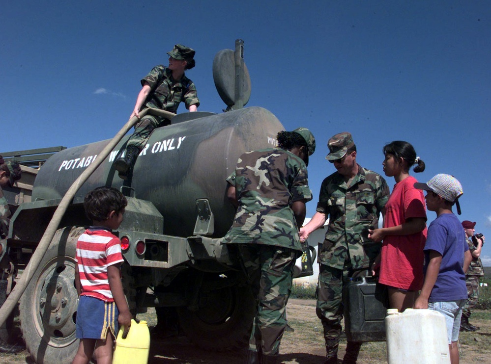 U.S. Army personnel deliver clean drinking water to the town of Comayagua, Honduras.