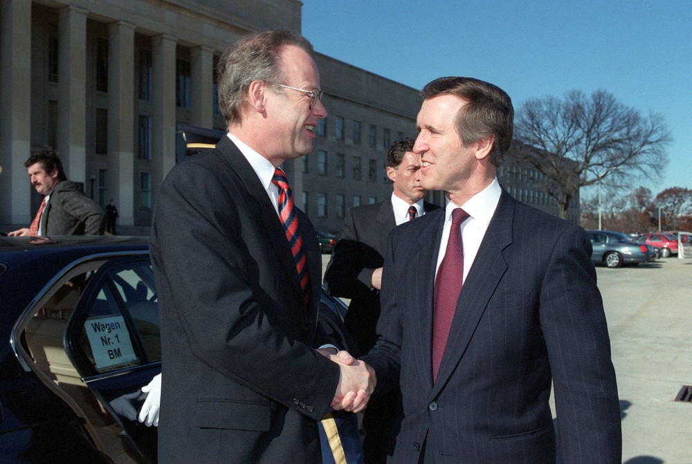 Secretary Cohen greets German Minister of Defense Rudolf Scharping at the Pentagon.