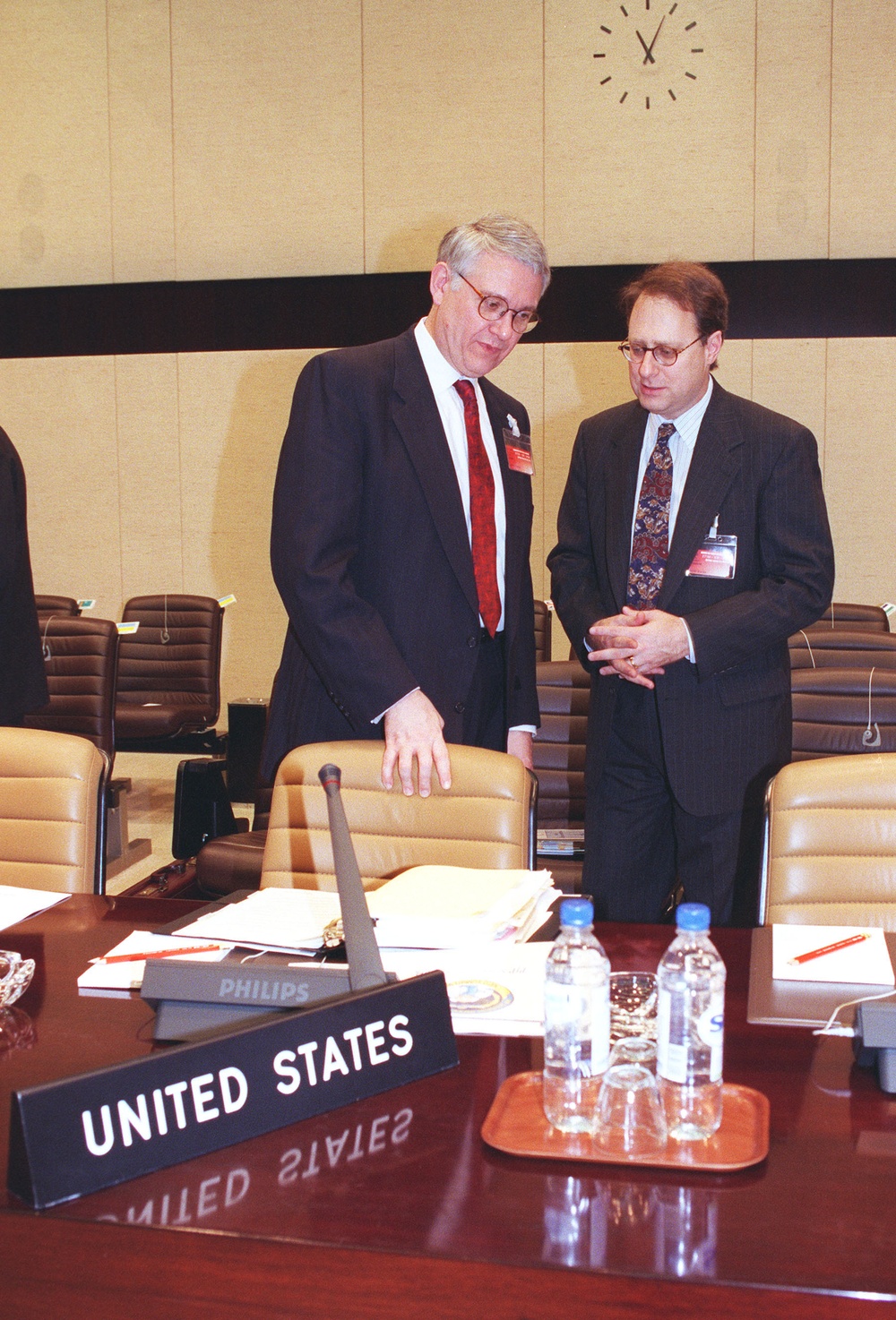 Deputy Secretary Hamre confers with U.S. Ambassador to NATO Alexander (Sandy) Vershbow.