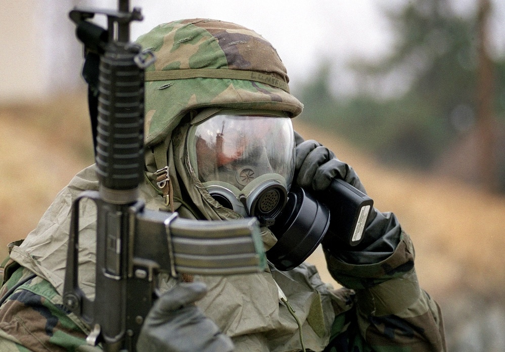 A member of the 51st Security Forces talks through his MCU-2P chemical/biological protective mask.