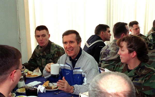 Secretary Cohen enjoys lunch with some of the men and women at Misawa Air Base, Japan.