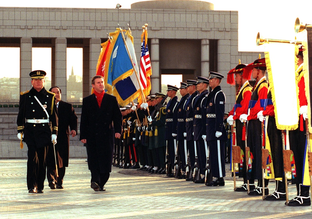 Secretary Cohen inspects the troops at the Korean War Memorial in Seoul.