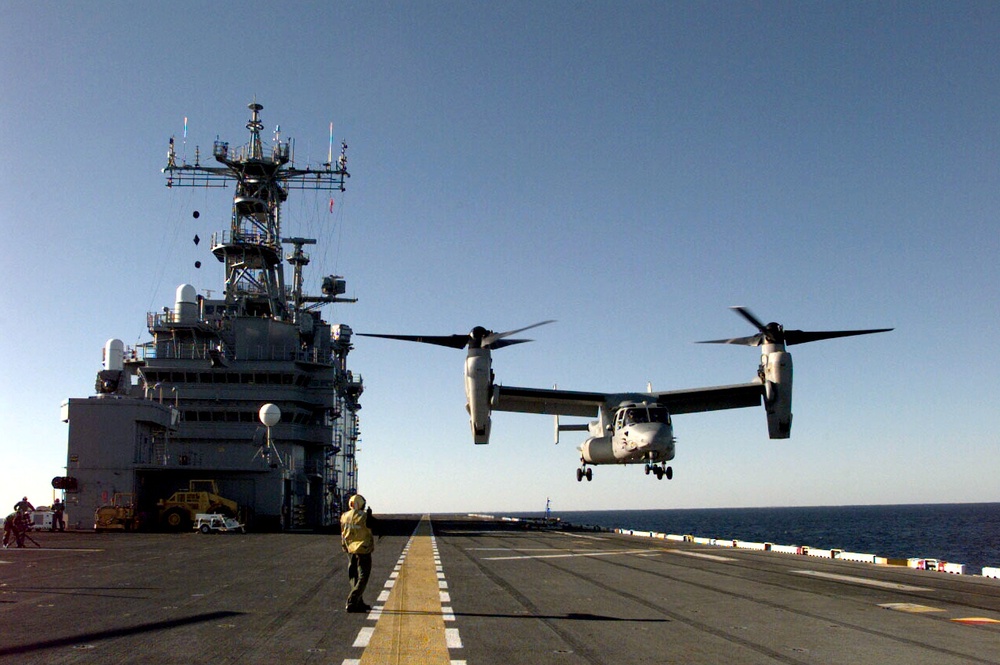 An MV-22 Osprey aircraft makes its landing approach to the flight deck of the USS Saipan. An MV-22 Osprey aircraft makes its landing approach to the flight deck of the USS Saipan.