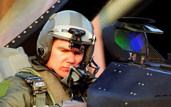 A pilot from the 510th Fighter Squadron makes a last-minute check of his maps.