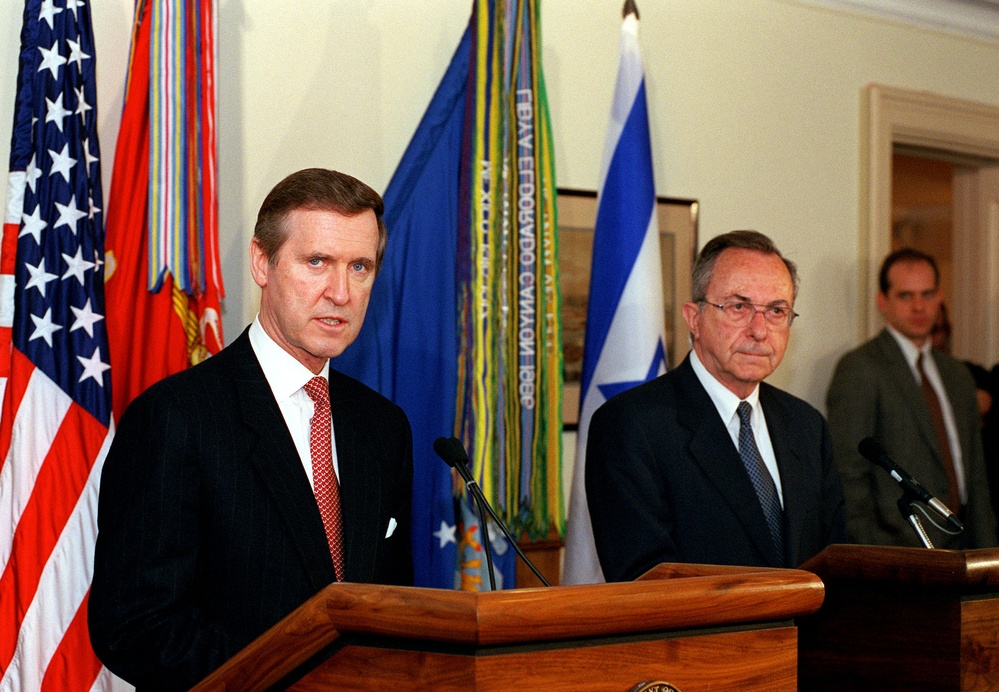 Secretary Cohen answers a question during a joint press conference with Minister Arens.