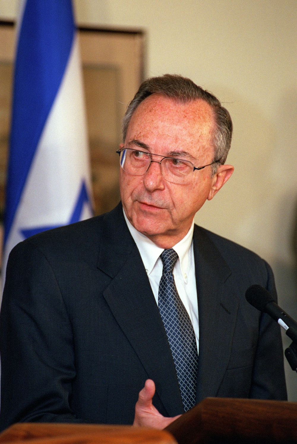 Israeli Minister of Defense Arens answers a question during a joint press conference with Secretary Cohen.