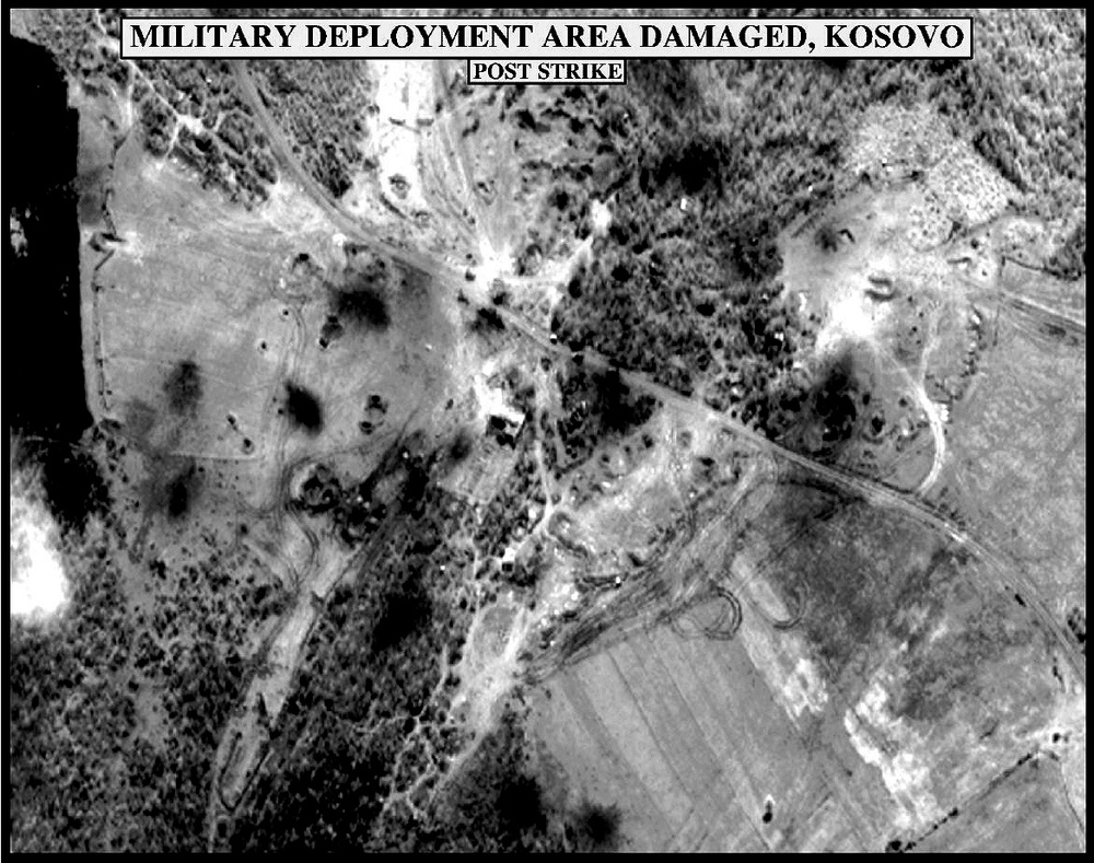 Post-strike bomb damage assessment photograph of Military Deployment Area Damaged, Kosovo.
