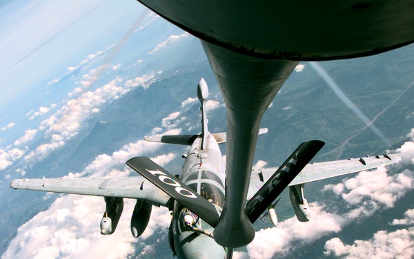 A U.S. Navy EA-6B Prowler refuels from a U.S. Air Force KC-135R Stratotanker.