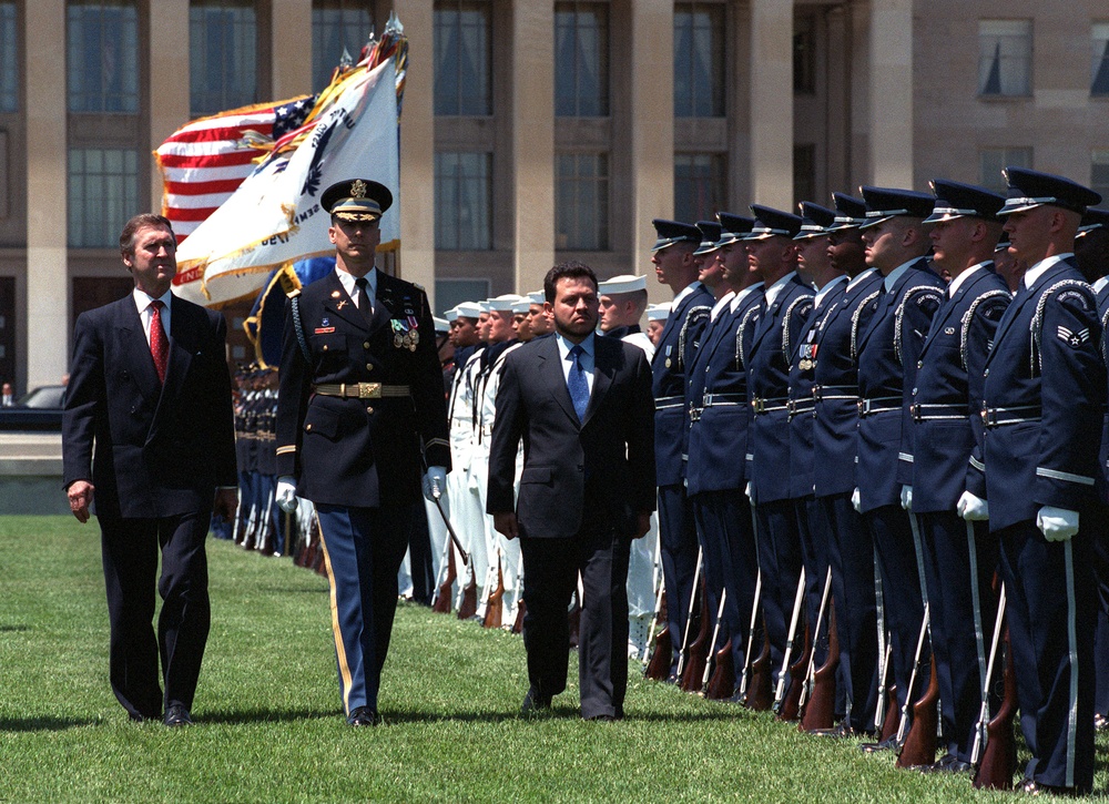 His Majesty King Abdallah II inspects the joint services honor guard at the Pentagon.