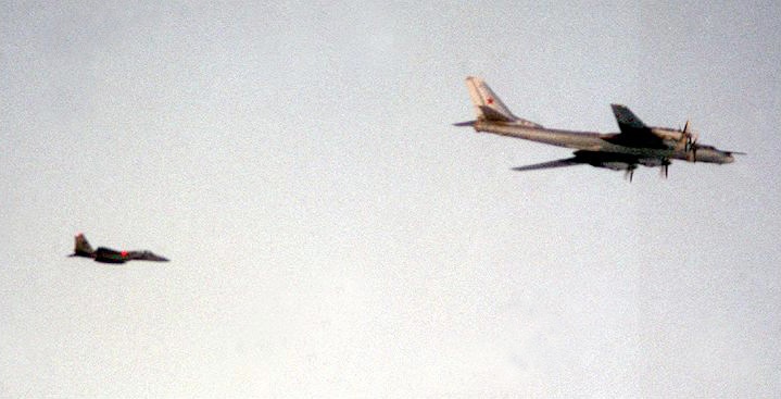 U.S. Air Force F-15 Eagle escorts a Russian Tu-95 Bear H strategic bomber.