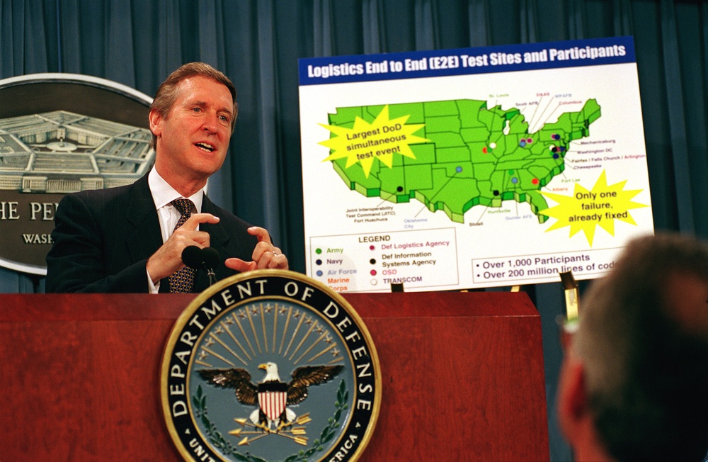 Secretary Cohen briefs reporters on a test of the DoD logistics system to check for Y2K problems.