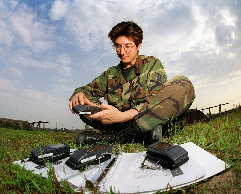 Staff Sgt. Bozeman demonstrates the operational check she performed on the Global Positioning System units.