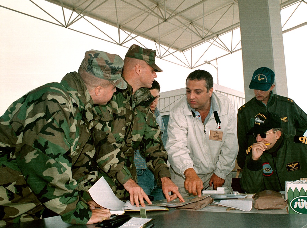 U.S. Marine Corps liaison officers and Turkish military officers plan the movement of relief supplies.