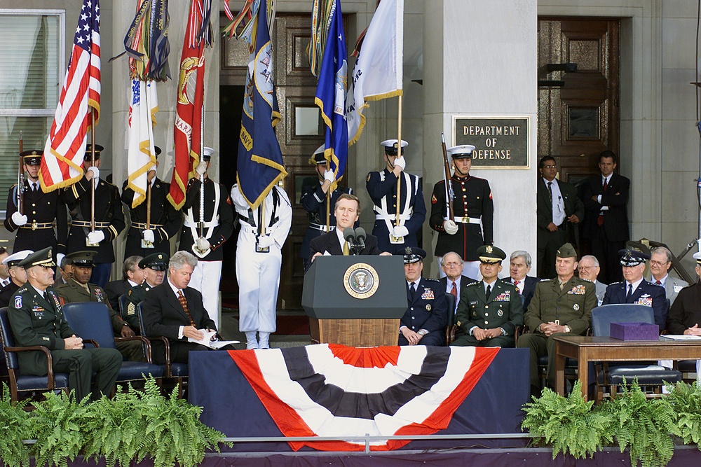 Secretary Cohen introduces President Bill Clinton at the Pentagon.