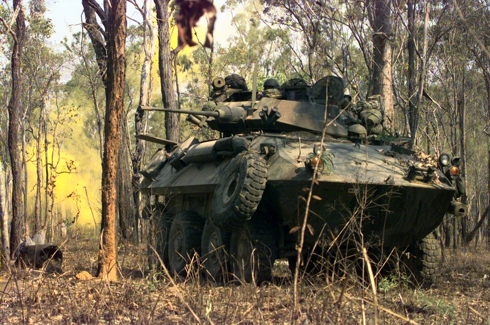U.S. Marines from 3rd Light Armored Reconnaissance Company train the turret of their Light Armored Vehicle.