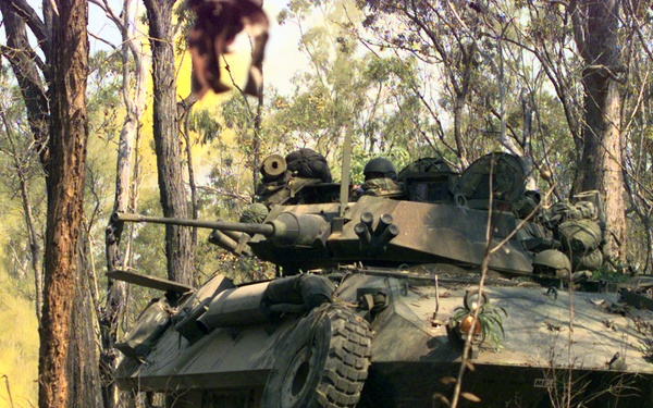 U.S. Marines from 3rd Light Armored Reconnaissance Company train the turret of their Light Armored Vehicle.