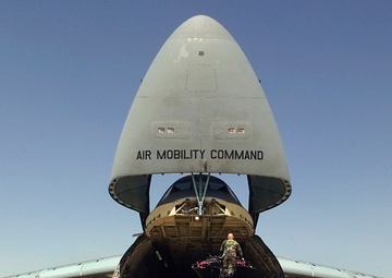 U.S. Army personnel unload their UH-60L Black Hawk helicopters from a U.S. Air Force C-5 Galaxy at Cairo West.