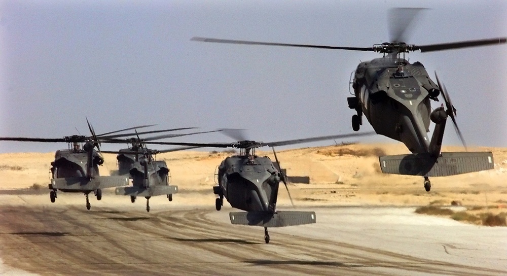 U.S. Army UH-60L Black Hawk helicopters lift off at Cairo West Air Base, Egypt, during Exercise Bright Star.