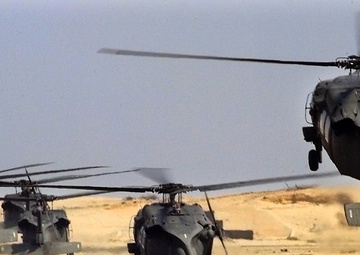 U.S. Army UH-60L Black Hawk helicopters lift off at Cairo West Air Base, Egypt, during Exercise Bright Star.