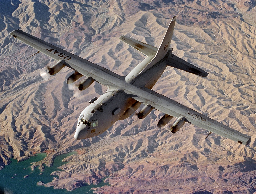 An EC-130E Airborne Battlefield Command and Control Center flies a training mission over Lake Mead, Ariz.