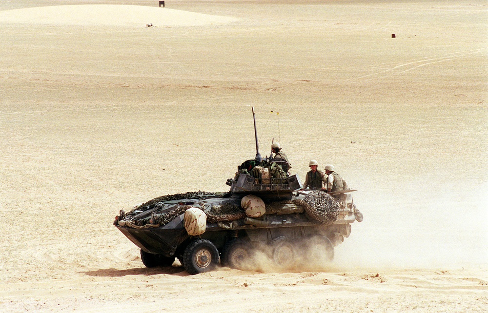 A U.S. Marine Corps LAV maneuvers at the conclusion of a live-fire exercise at the Udairi Training Range.