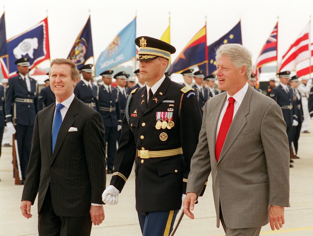 President Clinton and Secretary Cohen return to the reviewing stand after inspecting the honor guard at Andrews Air Force Base.