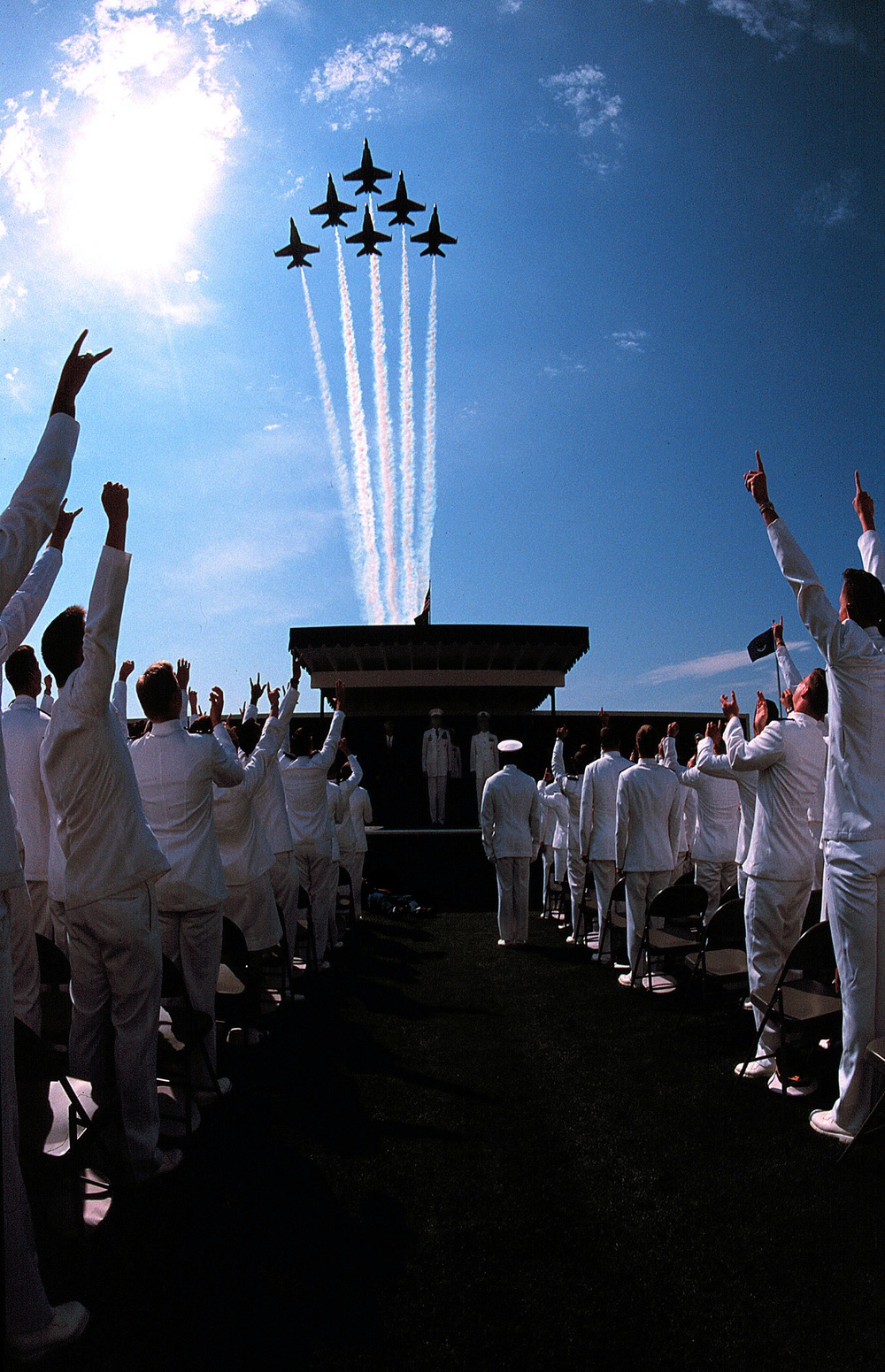 The U.S. Naval Academy's graduating class of 2000 cheers the Blue Angels.