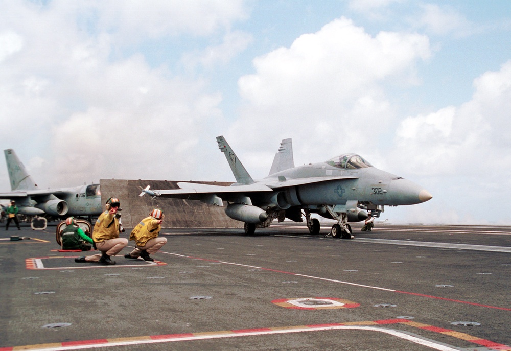 A U.S. Navy F/A-18 Hornet launches from the flight deck of the USS George Washington (CVN 73) off the coast of Puerto Rico.