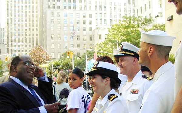 NBC's Today Show personality Al Roker chats with U.S. Navy Lt. Christa Sturbois.
