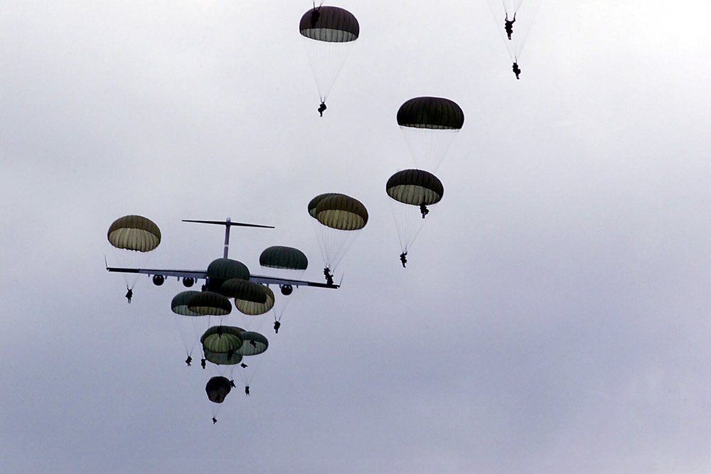 Paratroopers from the U.S. Army's  82nd Airborne and the Ukraine's 80th Air Mobile parachute from a C-17 Globemaster III.