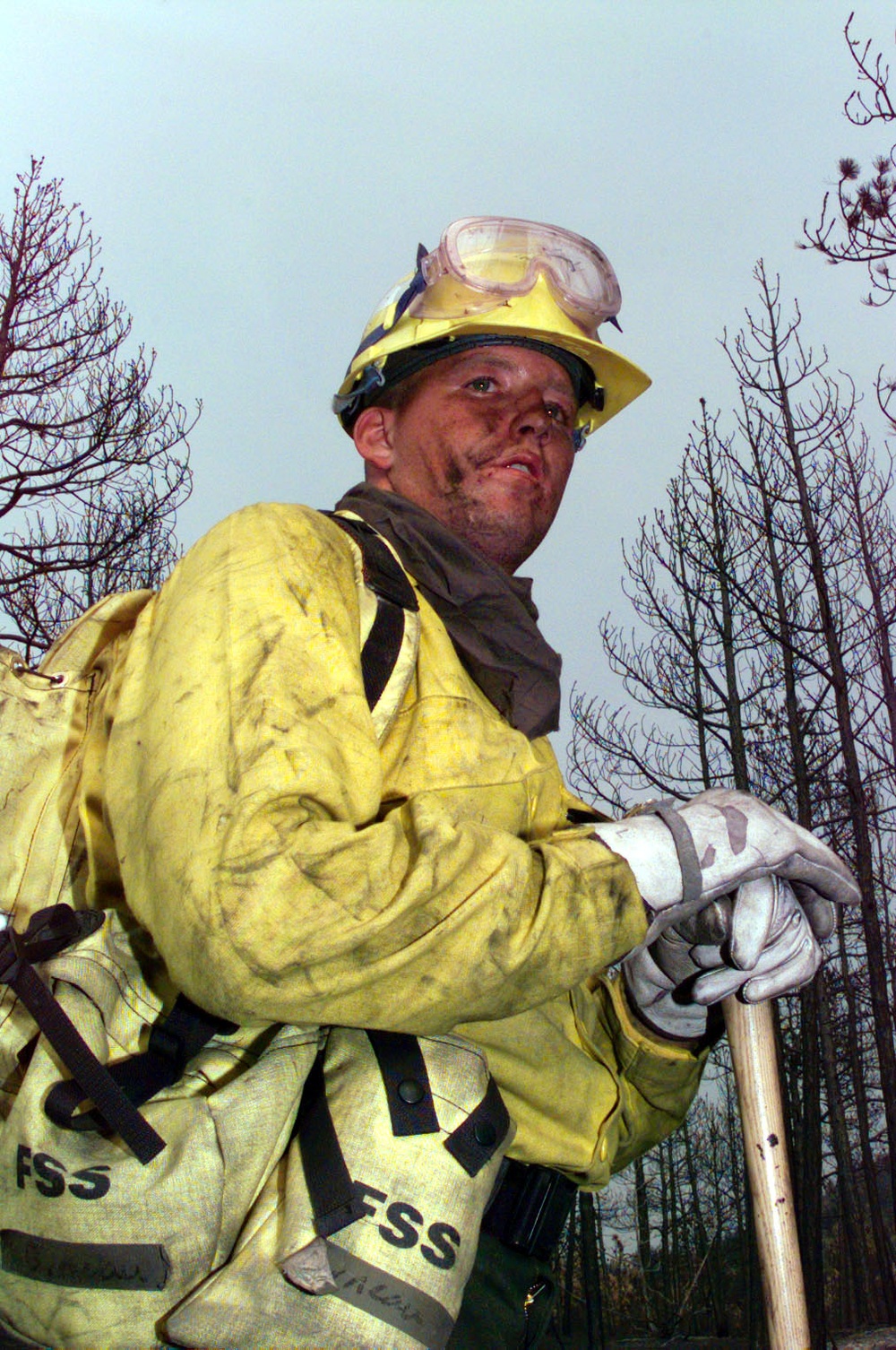 Montana Army National Guard Spc. Brandon Garneau takes a well-deserved break while helping to fight the Cave Gulch Fire.