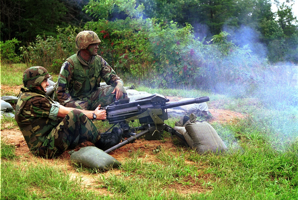 Richard Castanet fires a Mark-19 automatic grenade launcher on Range 6 at Marine Corps Base Quantico, Va.