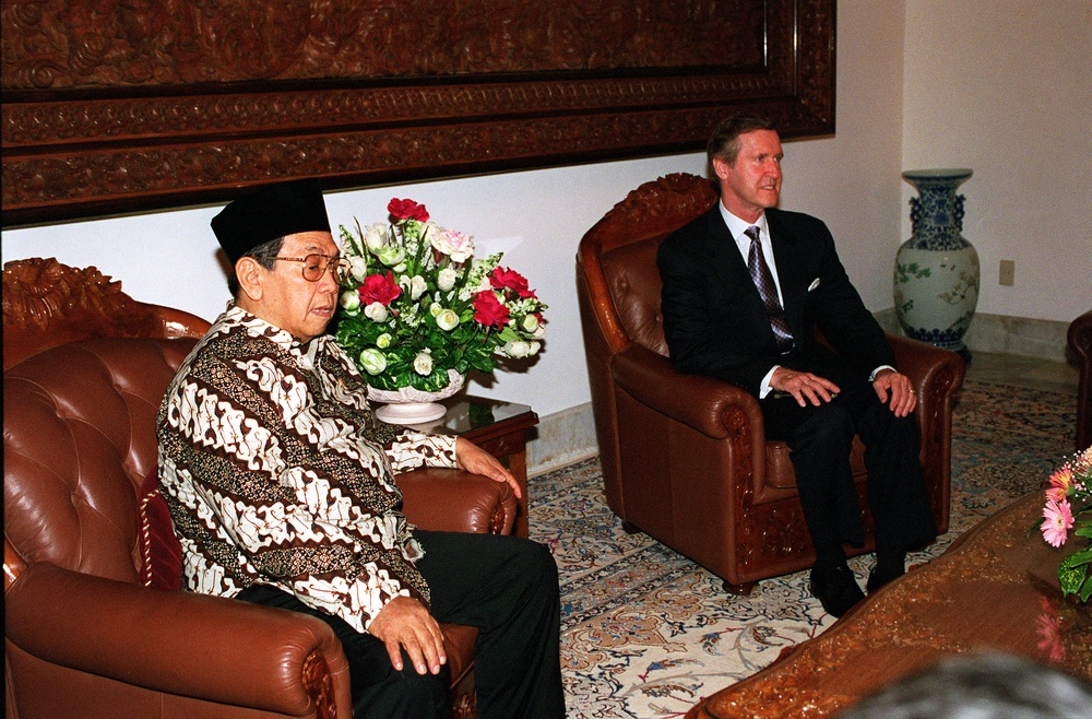 Indonesian President Abdurrahman Wahid and Secretary Cohen pose for photographers prior to their meeting in Jakarta.