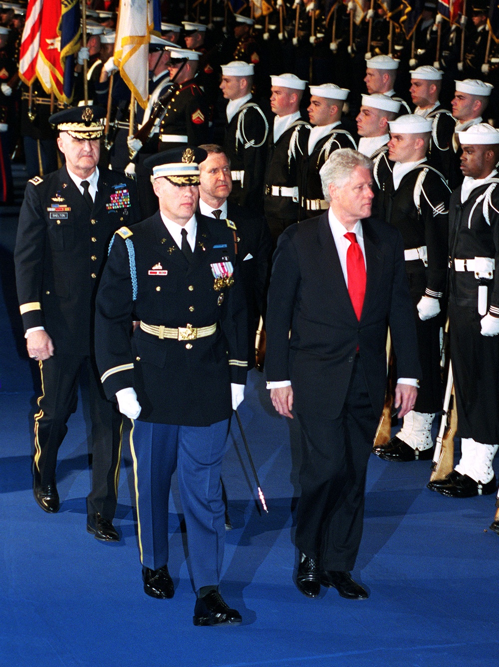 Commander of Troops Col. Thomas M. Jordan escorts President Clinton as he inspects the ceremonial honor guard at Fort Myer.