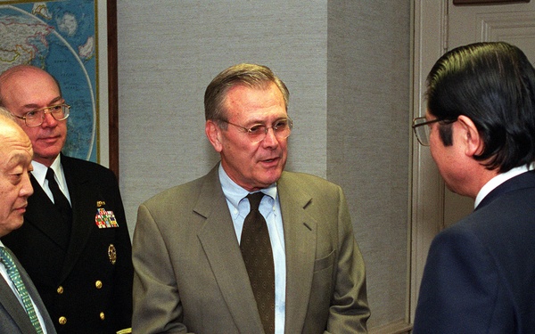 Secretary Rumsfeld talks to Japanese Senior Vice Minister of Foreign Affairs Seishiro Eto in the Pentagon.