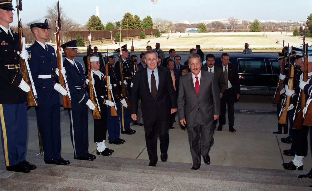 Secretary Rumsfeld escorts President Andres Pastrana, of Colombia, into the Pentagon.