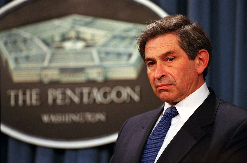 Deputy Secretary of Defense Paul Wolfowitz listens to a reporter's question in the Pentagon.