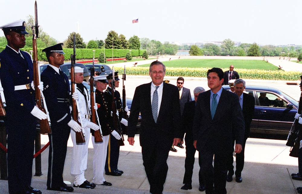 Secretary Rumsfeld escorts Minister of Defense Federico Trillo through an honor cordon and into the Pentagon.